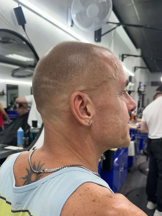 Clean head shave by barber Daniel Larrosa at Yovany Barbershop #3, North Fort Myers FL